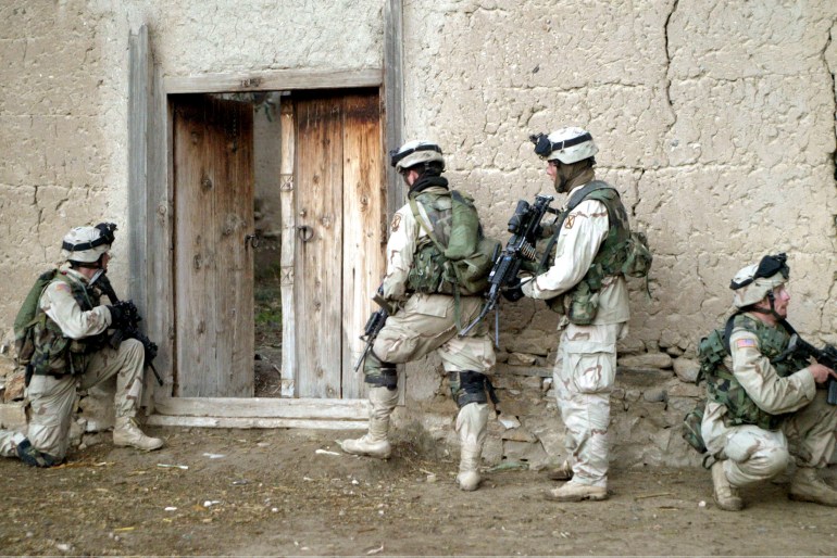 U.S. soldiers prepare to search a house in the northeastern Afghan province of Kunar in an undated handout photograph provided by the U.S. military. U.S. troops are taking part in Operation Mountain Resolve, which was launched earlier this month in Kunar to weed out Islamic militants. REUTERS/Handout AM/FA