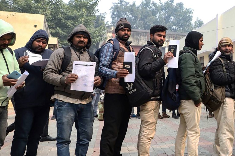 Indian workers align to submit registration forms as they seek employment in Israel during a recruitment drive at the Industrial Training Institute (ITI) in Lucknow, capital of India