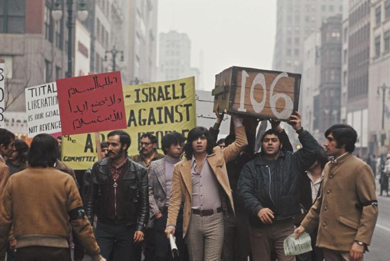 View of marchers holding placards as they protest on a street in Detroit against the shooting down of Libyan Arab Airlines Flight 114 Boeing 727 aircraft by Israeli fighter jets over the Sinai Peninsula on 21st February 1973. (Photo by Rolls Press/Popperfoto via Getty Images/Getty Images)