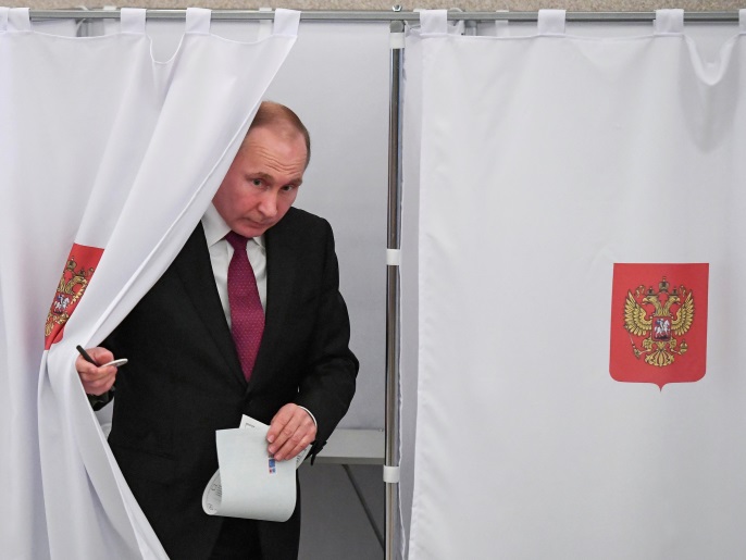 Russian President and Presidential candidate Vladimir Putin at a polling station during the presidential election in Moscow, Russia March 18, 2018. Yuri Kadobnov/POOL via Reuters TPX IMAGES OF THE DAY