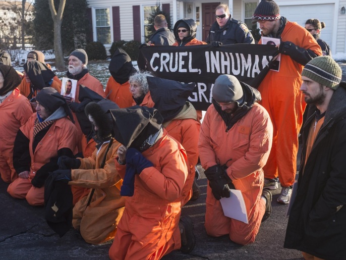WASHINGTON, DC - JANUARY 10: Activists of Codepink and Witness Against Torture stage demonstrations in front of the CIA director John Brennan