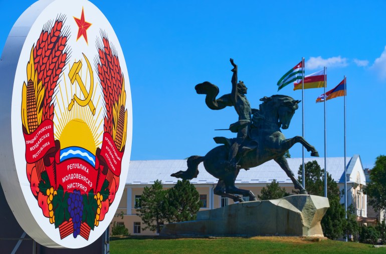 Tiraspol, Transnistria, Moldova - August 25, 2020: state emblem and the monument to Commander ...